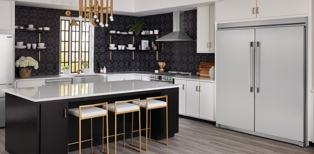 kitchen with Frigidaire Professional appliances and gold accents