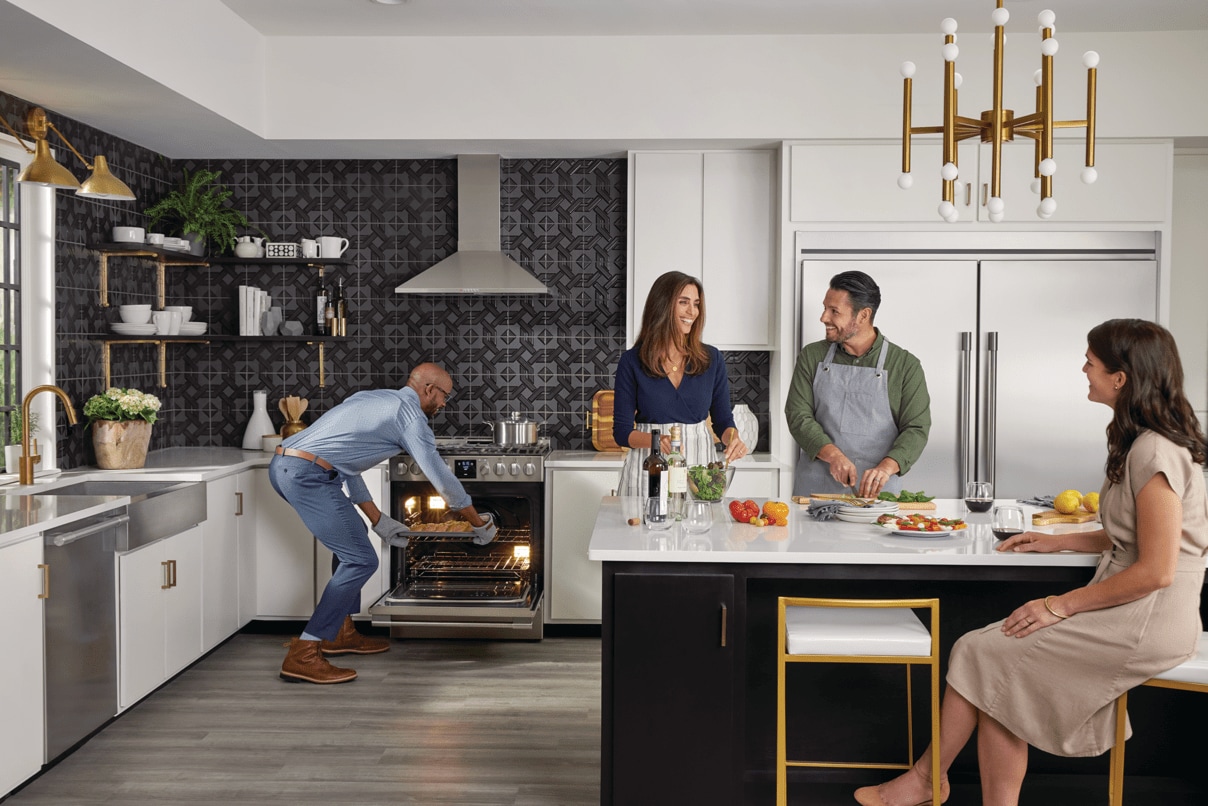 Family sitting in a Kitchen